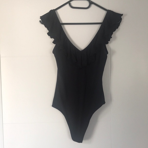 Black Ruffled V-neck Bodysuit | Aritizia | small - Picture 1 of 9